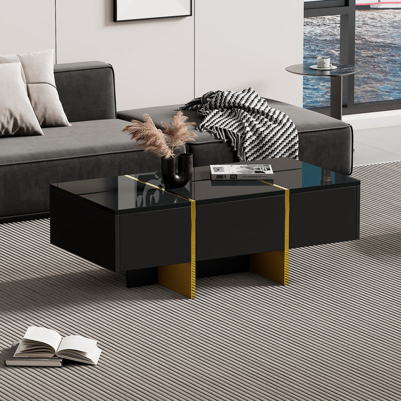 Table basse rectangulaire noire brillant 4 tiroirs accents dorés YIHRETH